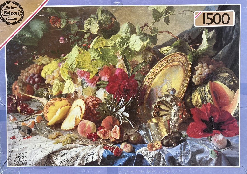 A lush classical still life painting featuring overflowing fruit, ornate metal vessels, and vibrant flowers on a table.
