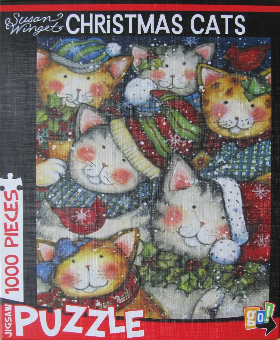 An illustration of five festive cats wearing winter hats and scarves amid falling snow.