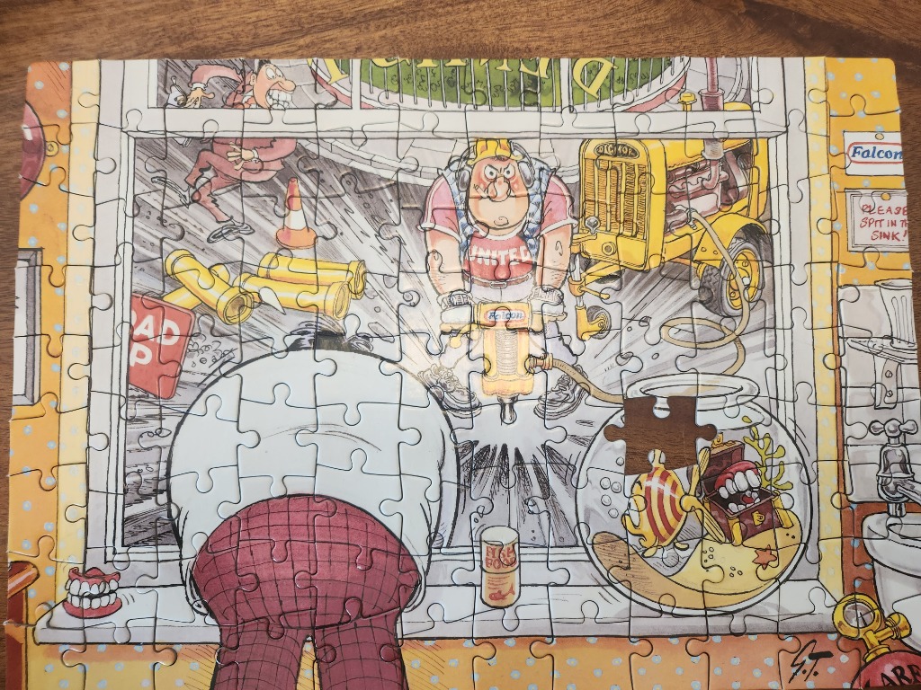 Cartoon of chaotic scene with cartoonish characters, tools, and a goldfish bowl.