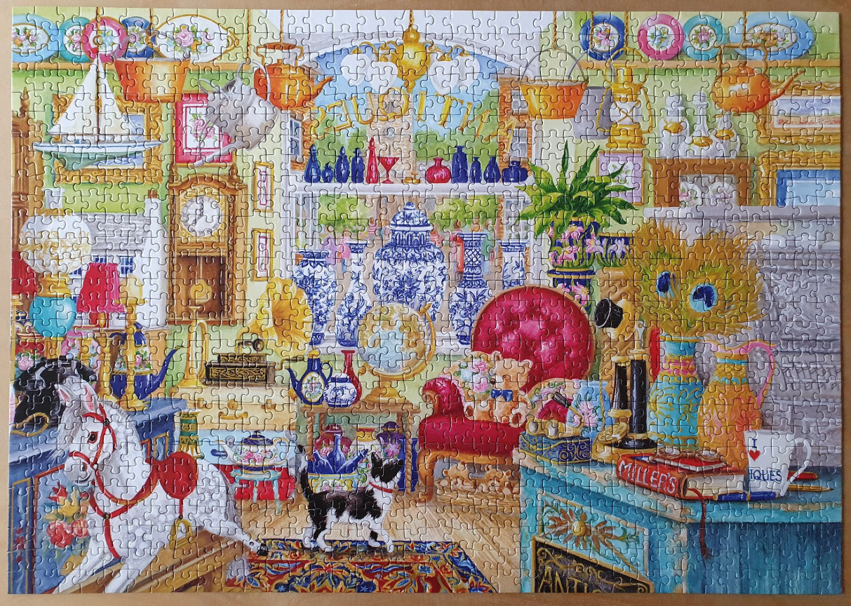 A whimsical illustration of a cluttered antique shop interior with a rocking horse and a black-and-white cat.
