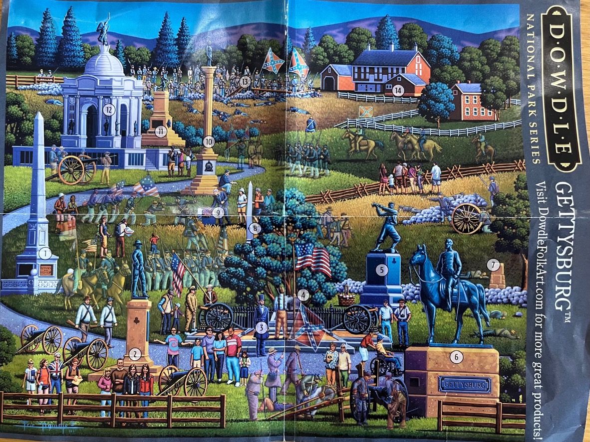 A whimsical illustration of the Gettysburg battlefield with various historical monuments, cannons, and modern-day visitors.