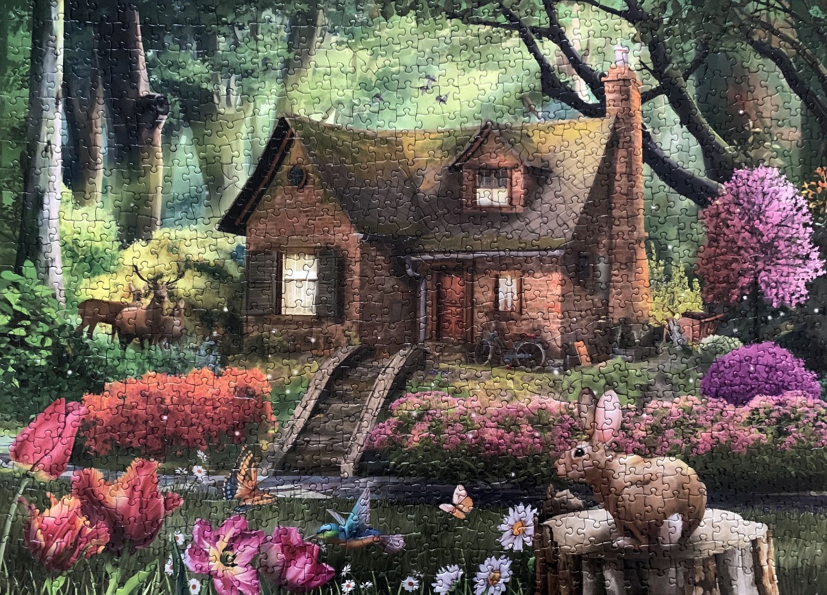 A cozy cottage nestled in a vibrant, blooming woodland garden with wildlife.