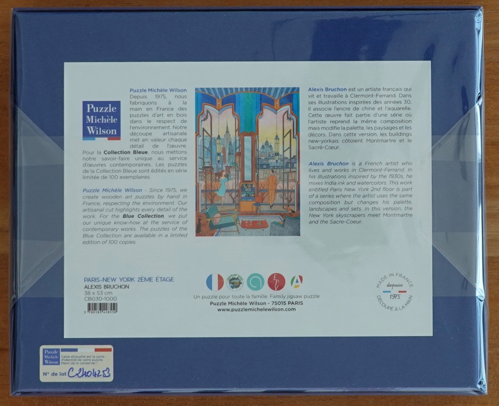 Alexis Bruchons watercolor of Paris & NYC skyline with ornate blue windows.