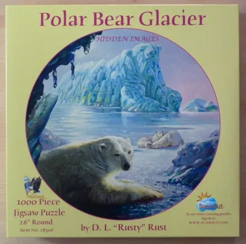 A circular oil painting depicting a large polar bear resting on ice in front of a giant glacier shaped like a bear.