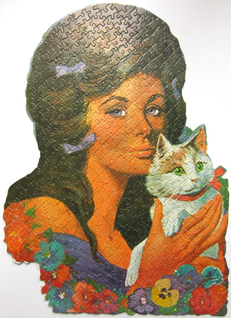 Illustration of a woman with dark hair holding a white and brown cat amongst colourful flowers.