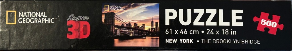 Photographic view of the Brooklyn Bridge and New York City skyline at sunset.