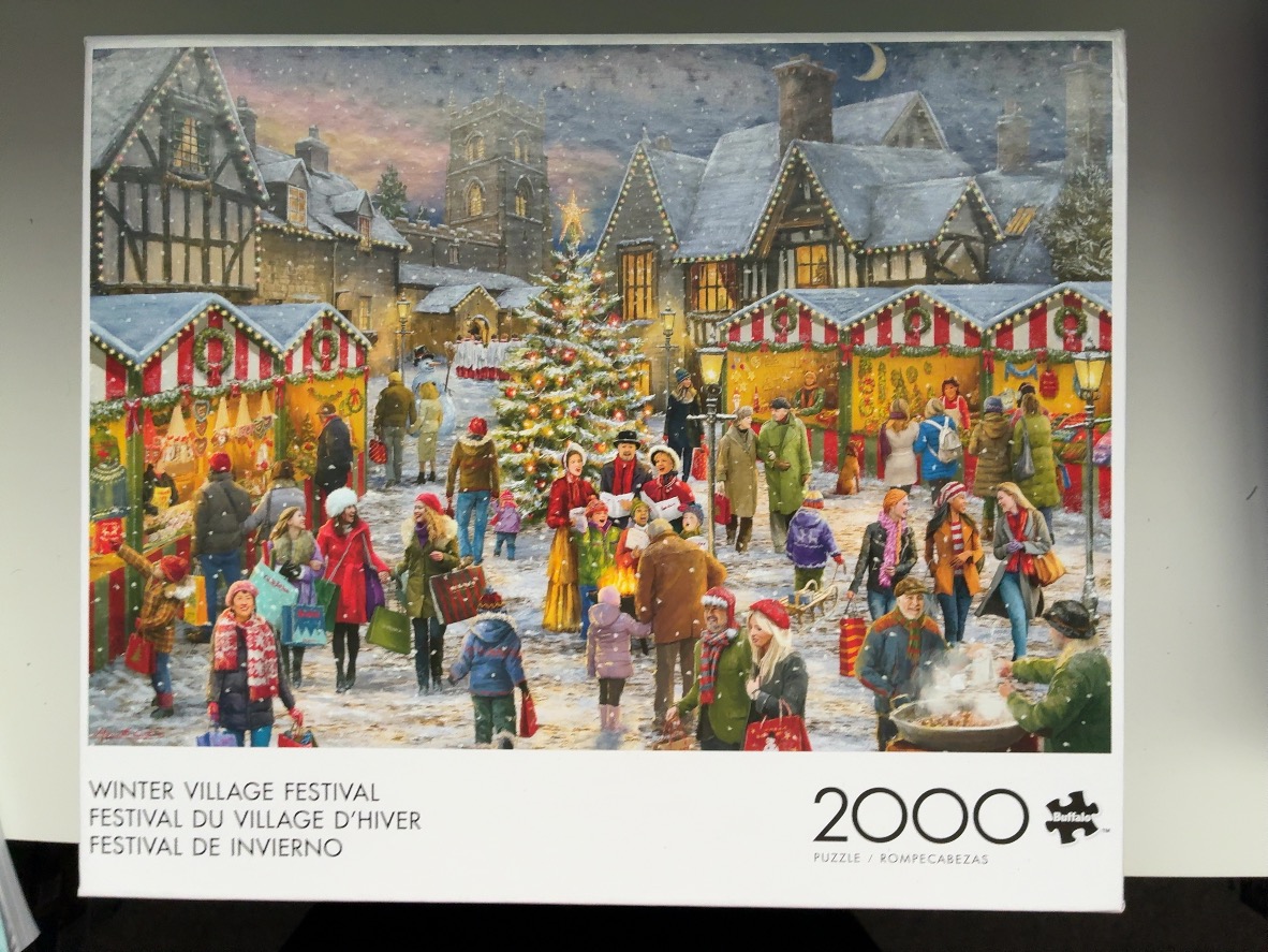 An outdoor evening Christmas market scene with a large tree, carolers, and shoppers in a snow-covered village.