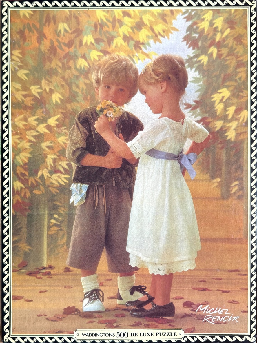 A young boy and girl standing on an autumn path, the girl offering the boy a small bouquet of wildflowers.