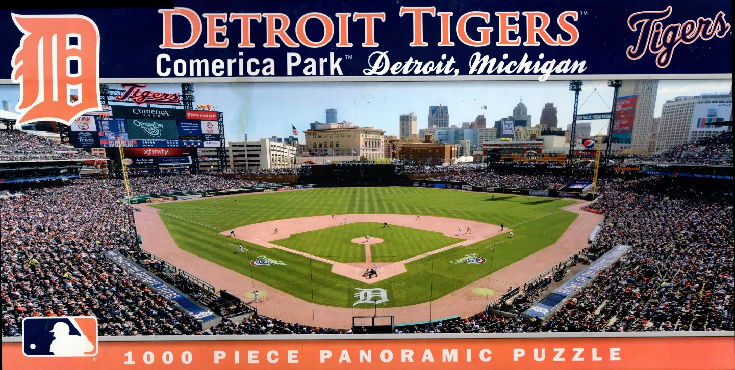 A panoramic view of Comerica Park in Detroit, Michigan with a full stadium of spectators.