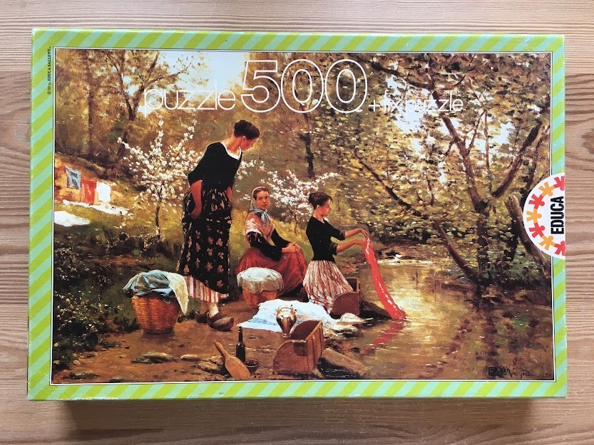 Three women washing clothes in a stream in a sunlit forest clearing, an oil painting style scene.