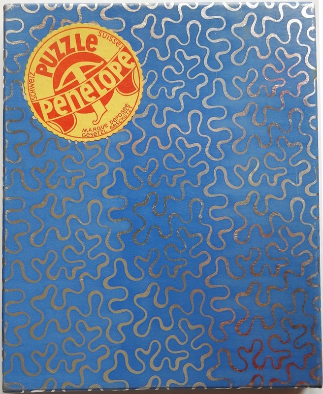 Abstract design of silver squiggly lines on a blue background with a circular yellow logo in the corner.