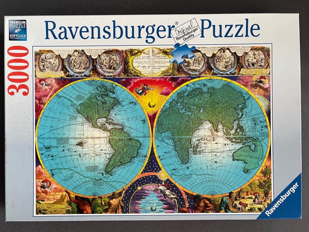 Antique style double-hemisphere world map illustration with ornate borders and mythological figures.