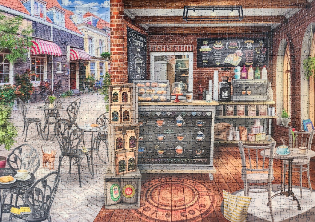 An outdoor cafe patio extending into a cozy indoor coffee shop interior.
