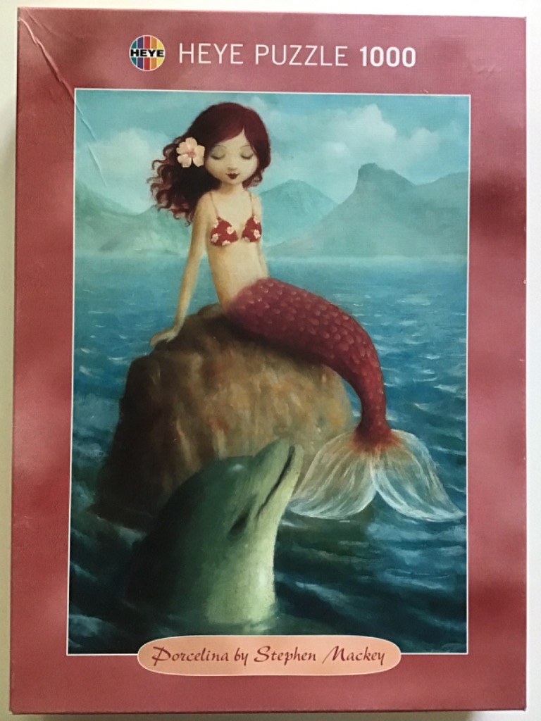An illustration of a young mermaid sitting on a rock in the ocean with a dolphin looking up at her.