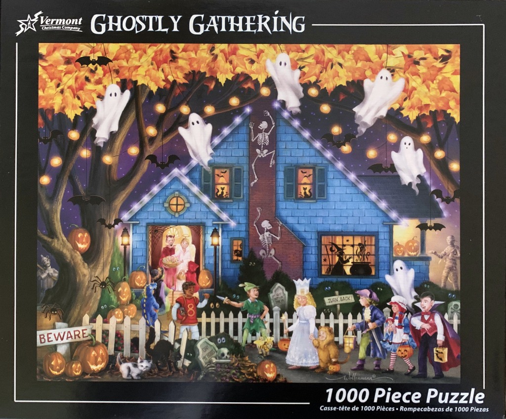 Illustration of children in Halloween costumes standing in front of a spooky blue house with ghosts and decorations.