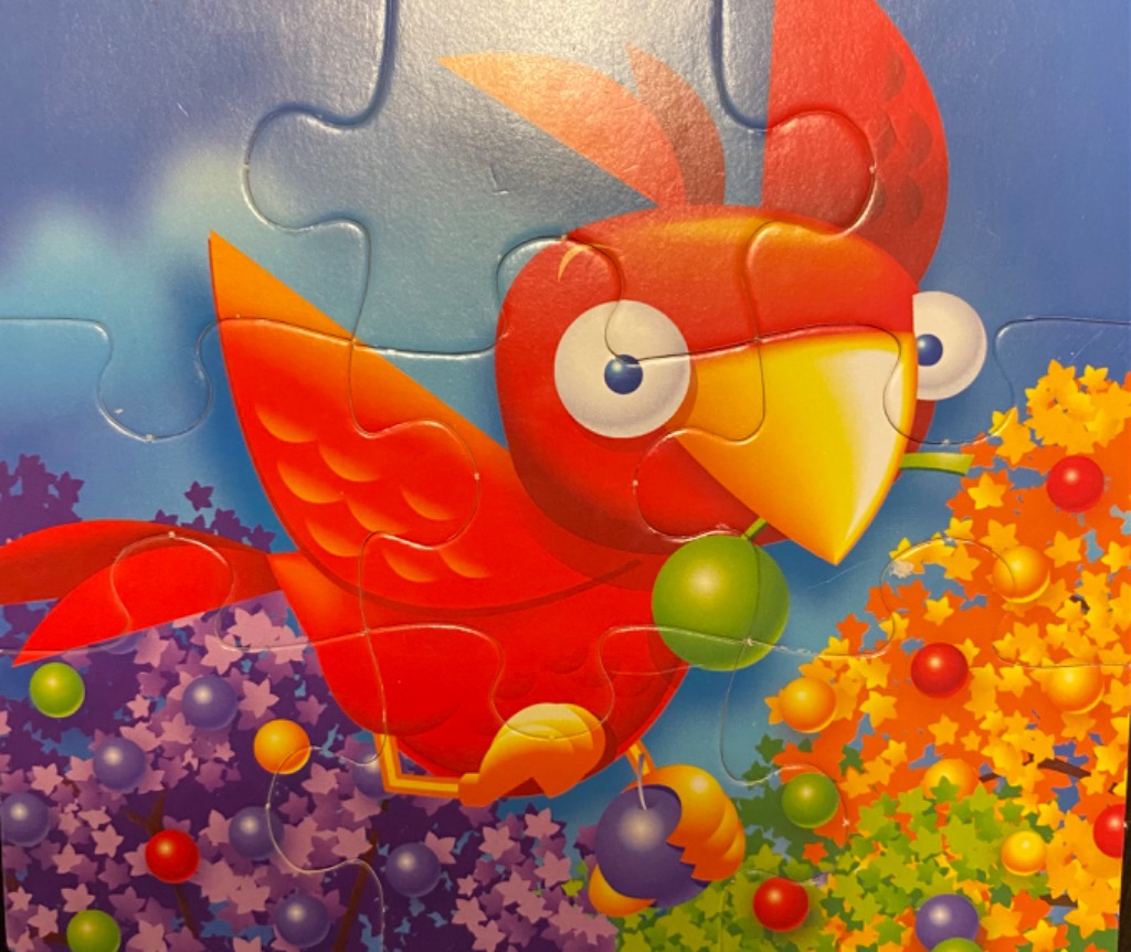 Cartoon red parrot flying over colorful trees