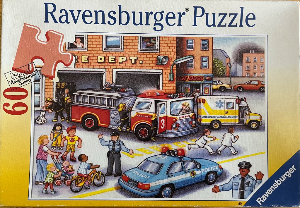 Busy cartoon illustration of emergency responders, fire trucks, and police cars in front of a brick fire station.