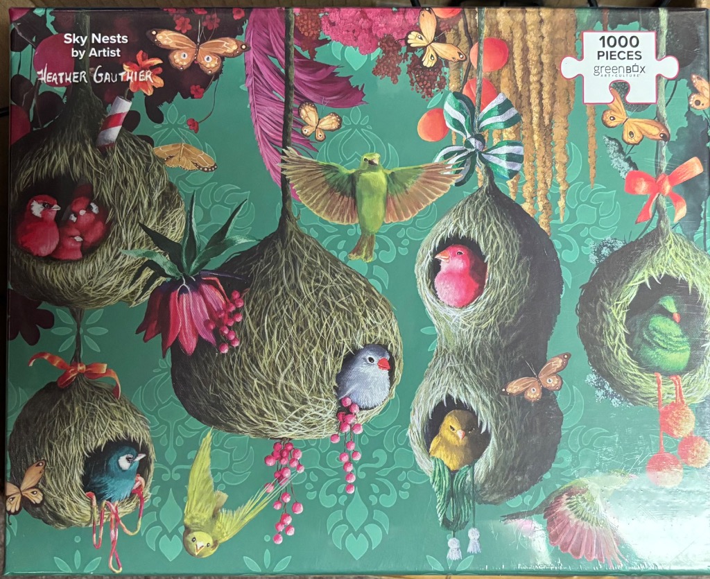Whimsical illustration of birds in hanging nests surrounded by butterflies and botanical elements on a teal background.