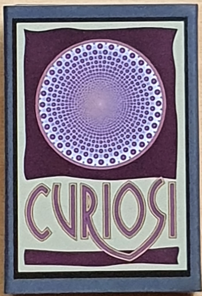 A graphic design featuring a purple geometric mandala of concentric dots above the text CURIOSI in a stylized font.