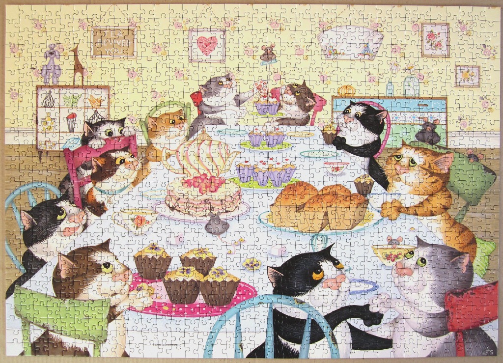 Cartoon illustration of many cats gathered around a dining table set for a tea party with cakes and muffins.