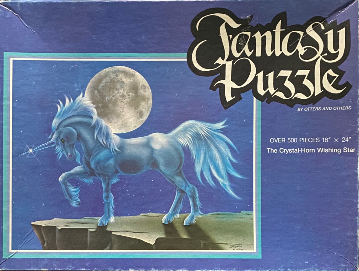 A blue unicorn standing on a cliff edge against a full moon and starry night sky.