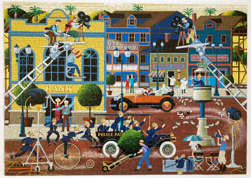 A whimsical illustration of a chaotic film set on a busy city street in the style of a silent movie.
