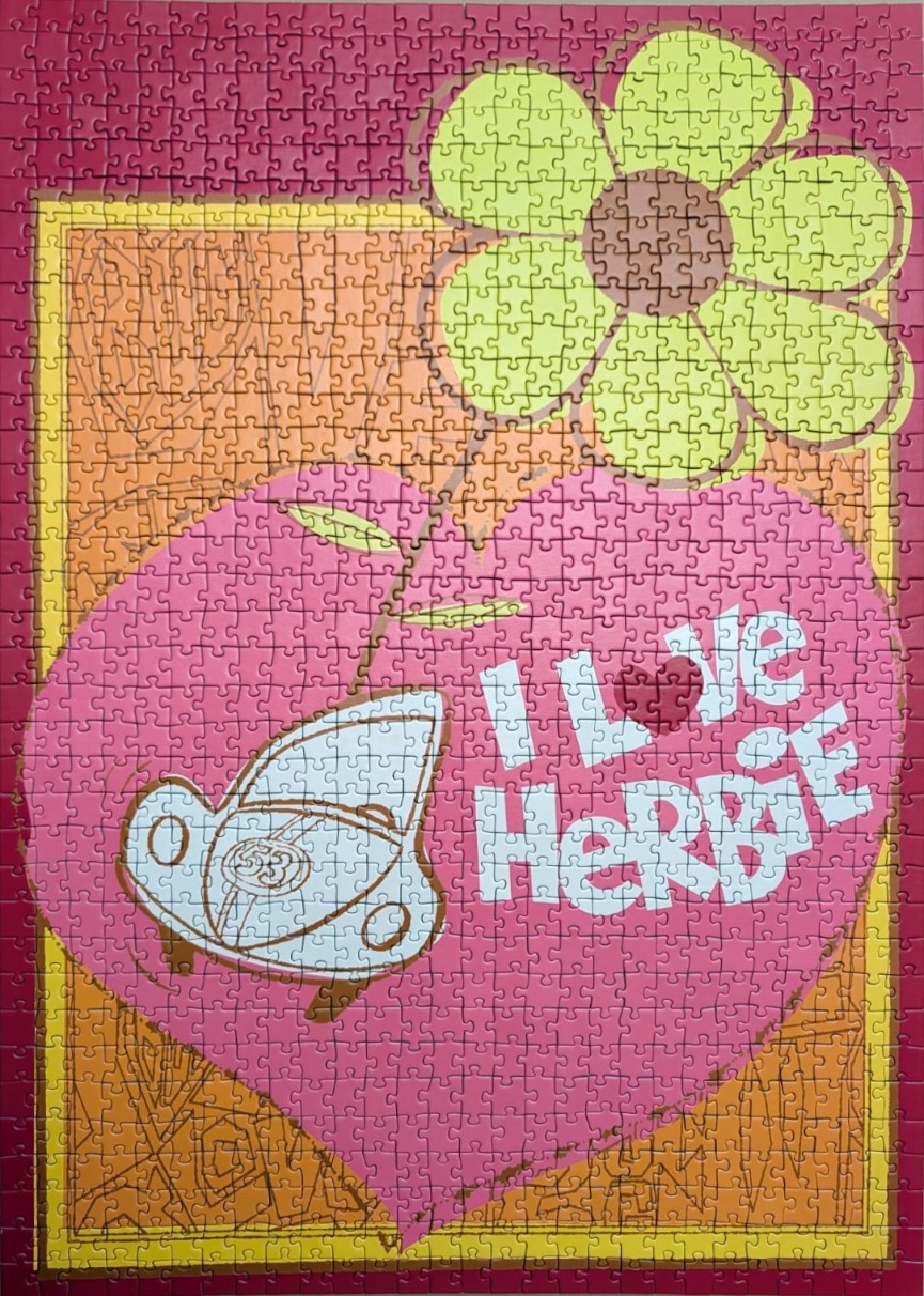 Retro-style illustration of Herbie the Love Bug featuring a heart, a daisy, and the text I Love Herbie.