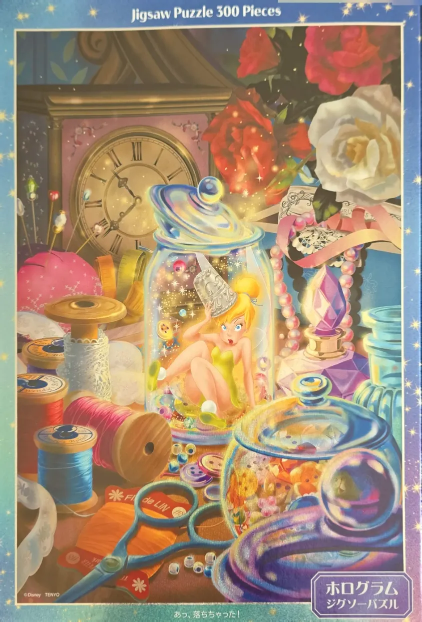 Tinker Bell trapped inside a glass jar surrounded by sewing notions and flowers