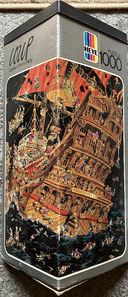 Cartoon illustration of a chaotic pirate ship named Shakewell with crew members engaged in a lively party at sea.