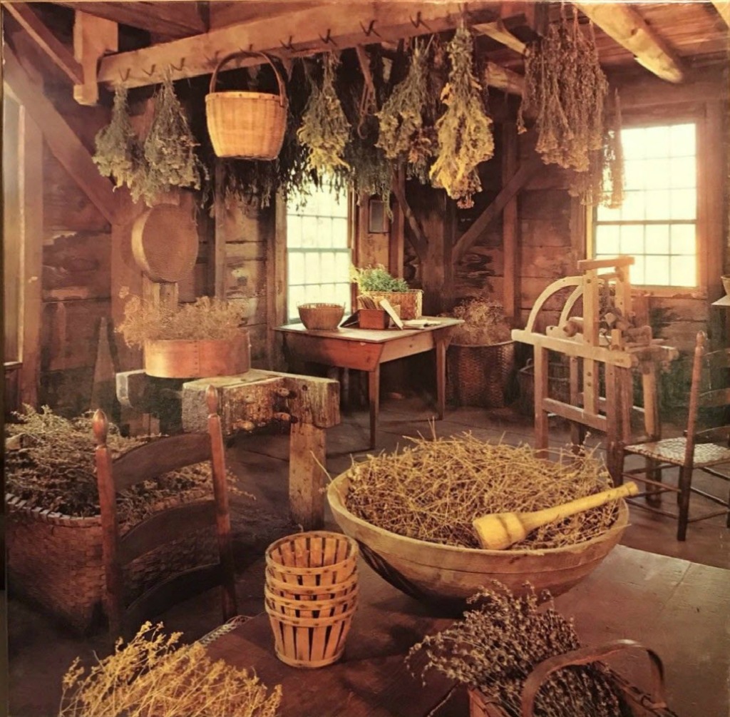 A rustic, sunlit wooden workshop filled with dried herbs and antique weaving tools.