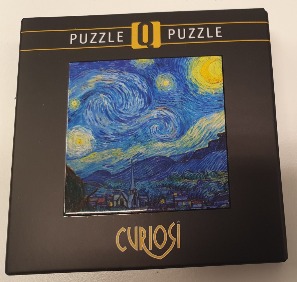 A reproduction of Vincent van Gogh's The Starry Night painting.