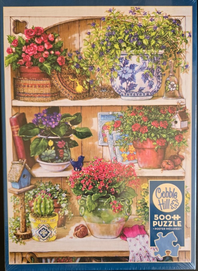 A cozy garden shelving unit filled with potted plants, flowers, and gardening accessories.