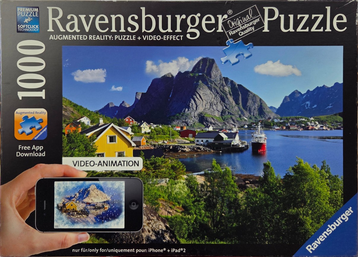 A sunny coastal village in Norway with colorful houses, a calm blue bay, and jagged mountain peaks in the background.