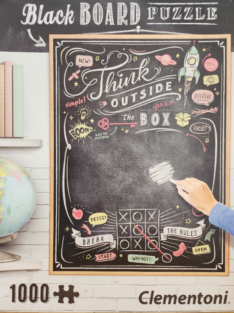 Chalkboard-style illustration with hand-drawn motivational text, space-themed icons, and a tic-tac-toe game.