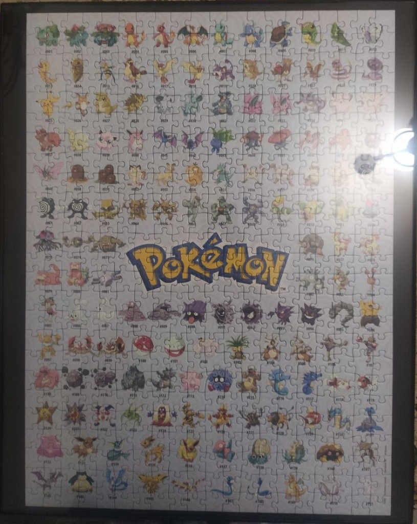 A framed poster-style image featuring the original 151 Pokemon in numerical order with the franchise logo in the center.