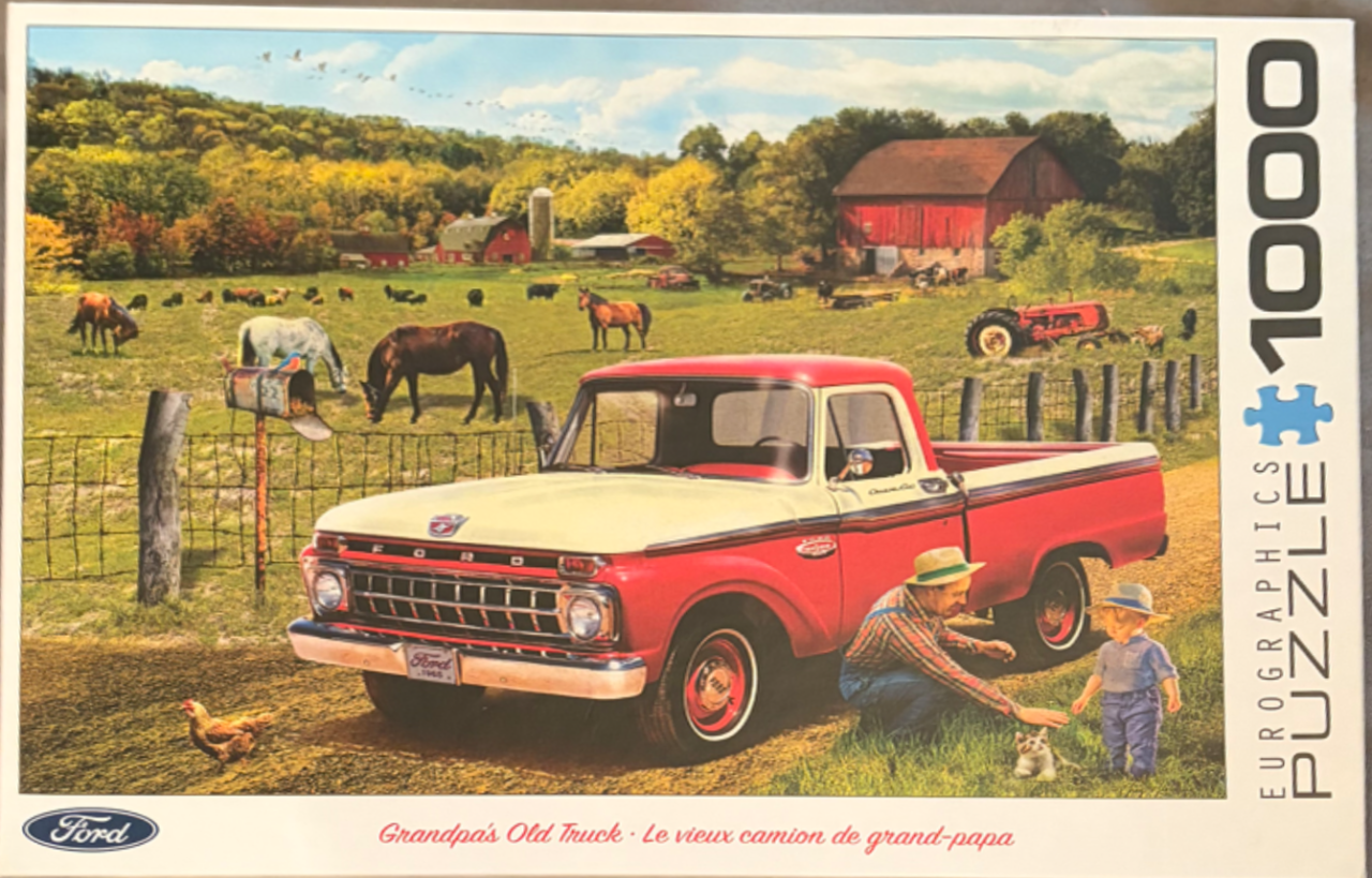 A vintage red and white Ford pickup truck parked on a farm with a man, child, and animals.
