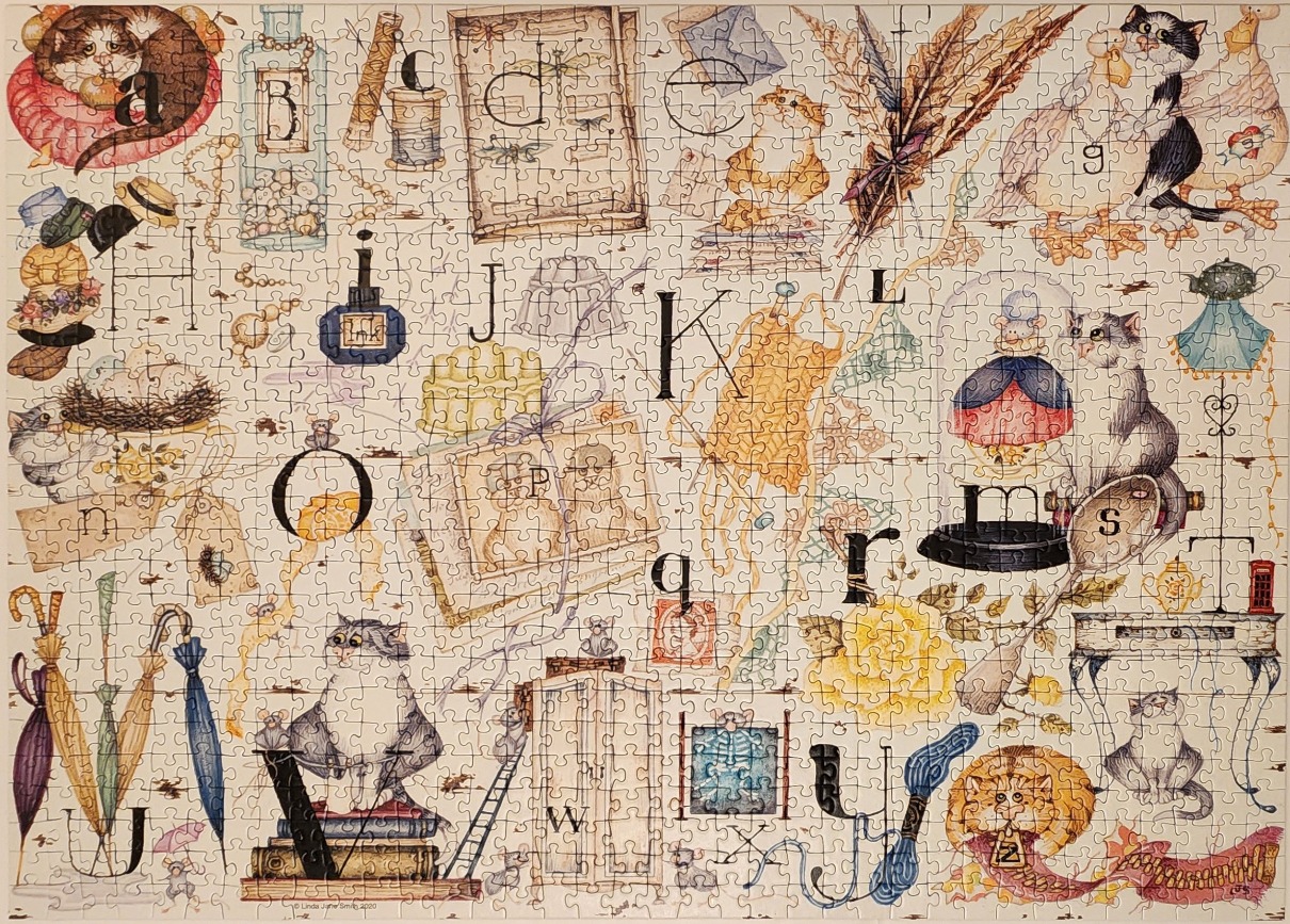An illustrated alphabet chart featuring cats, household items, and whimsical motifs in a soft, whimsical art style.