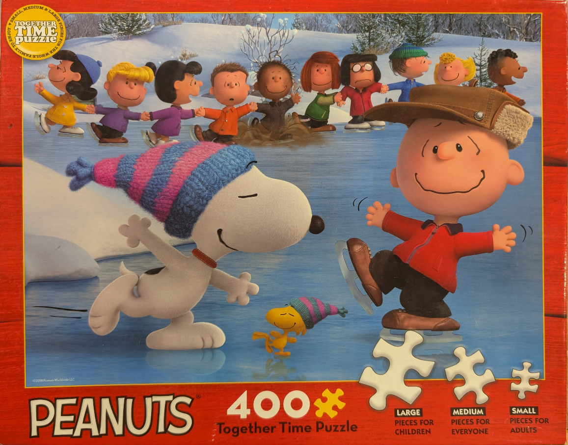Peanuts characters ice skating on a frozen pond in a winter landscape.