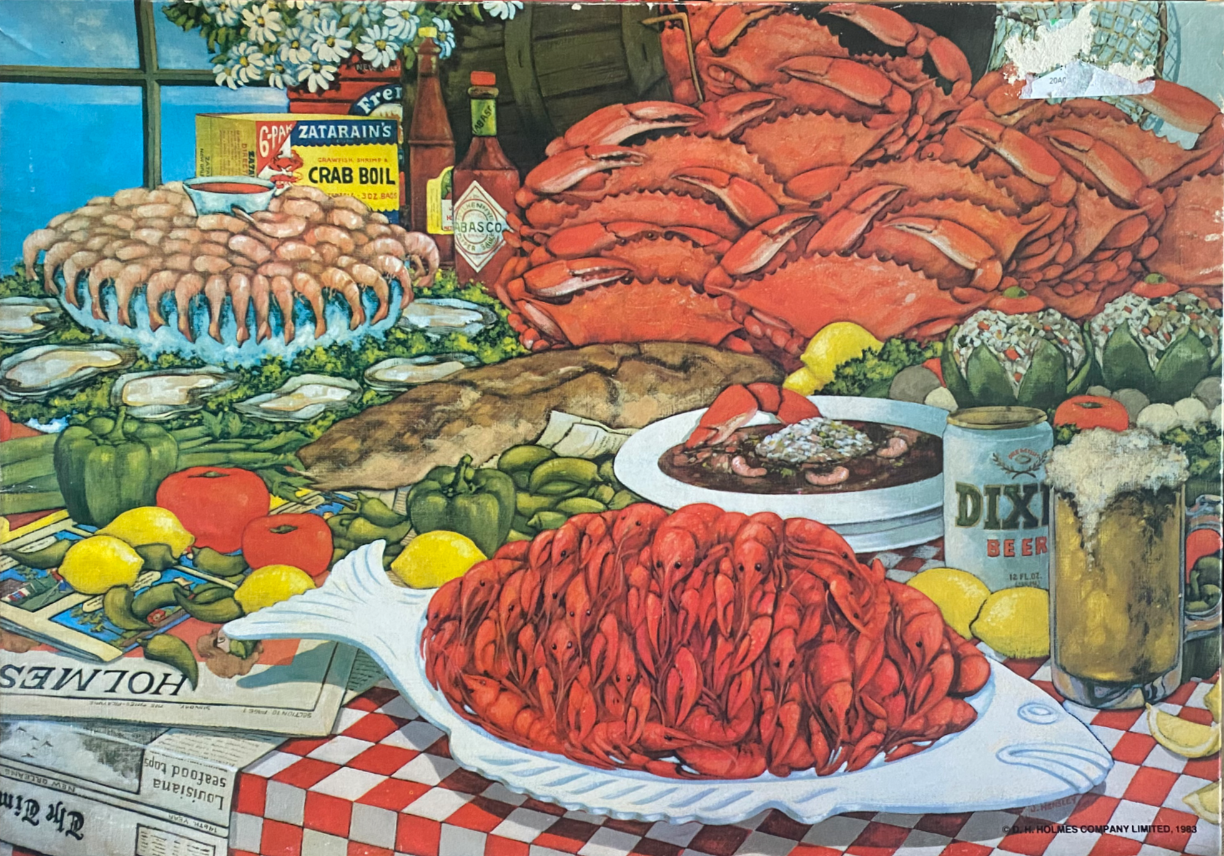 A festive Louisiana-style seafood feast spread on a checkered tablecloth.