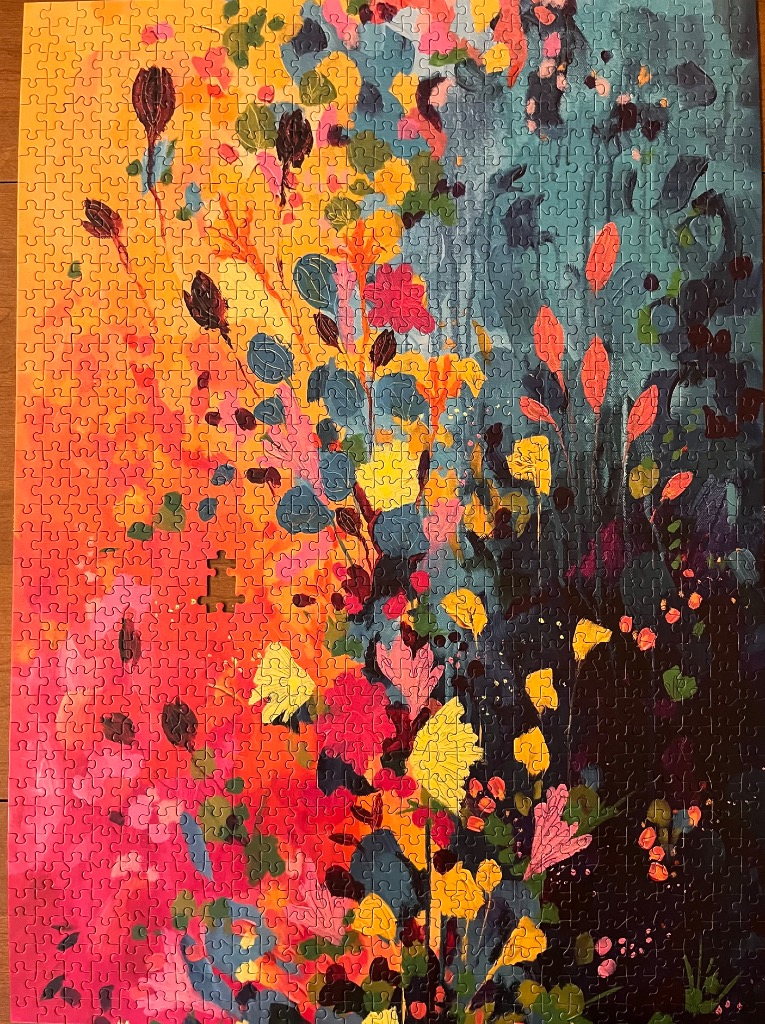 Abstract botanical painting with a transition from warm yellow and orange on the left to deep navy blue on the right.