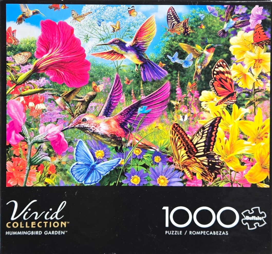 Vibrant garden scene featuring multiple hummingbirds and butterflies among colorful flowers.