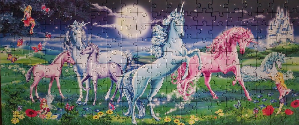 A fantasy illustration of a herd of unicorns in a moonlit meadow with fairies and a distant castle.
