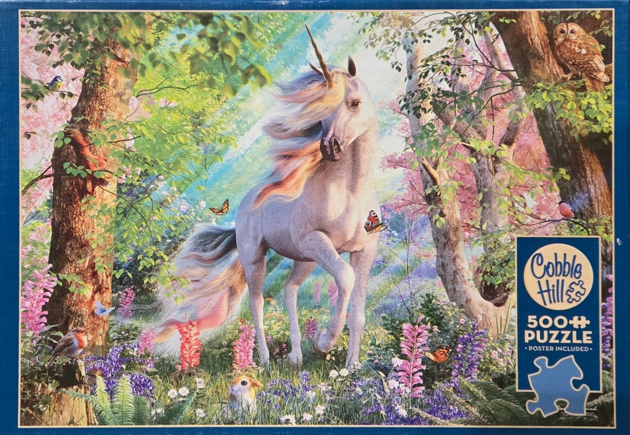A majestic white unicorn with a flowing, rainbow-colored mane and tail standing in a lush, magical forest.