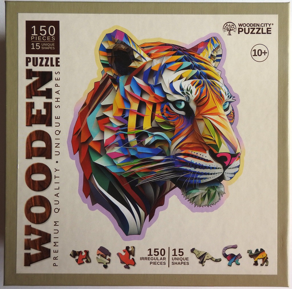A stylized artistic portrait of a tiger head composed of colorful geometric shapes against a plain background.