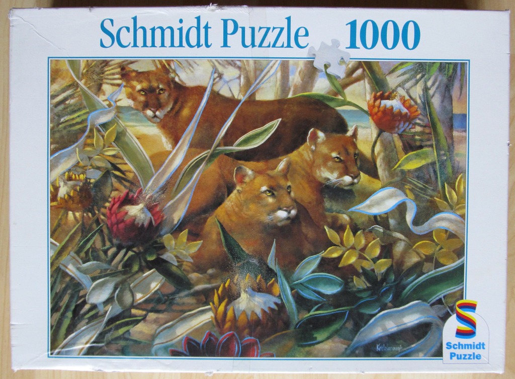 Painting of two cougars resting amidst tropical protea flowers and foliage.