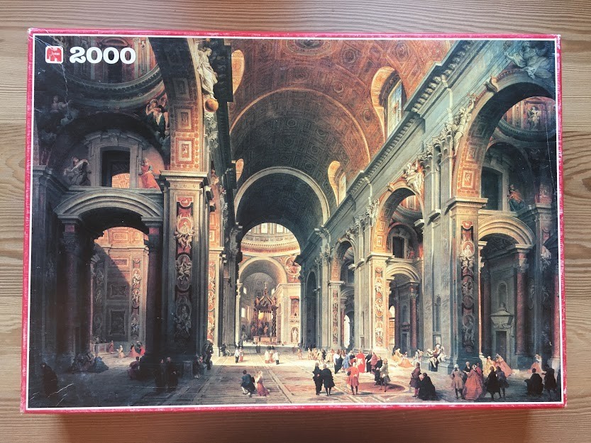 Classical painting of the interior of St. Peter's Basilica with tall arches, ornate columns, and small figures.