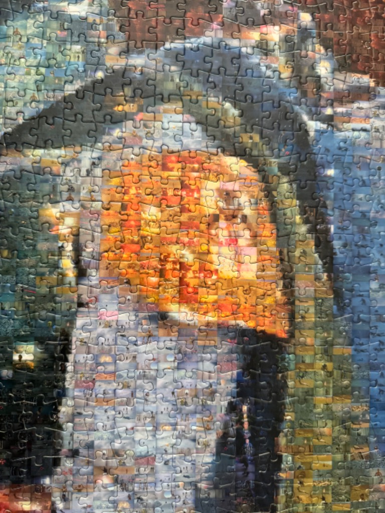 A photo mosaic of Leonardo da Vinci's Mona Lisa, constructed from hundreds of small individual images.