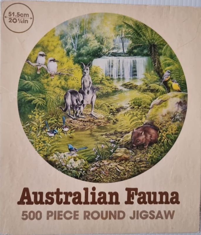 An illustration of Australian wildlife including kangaroos, a wombat, kookaburras, and blue wrens in a forest stream setting.