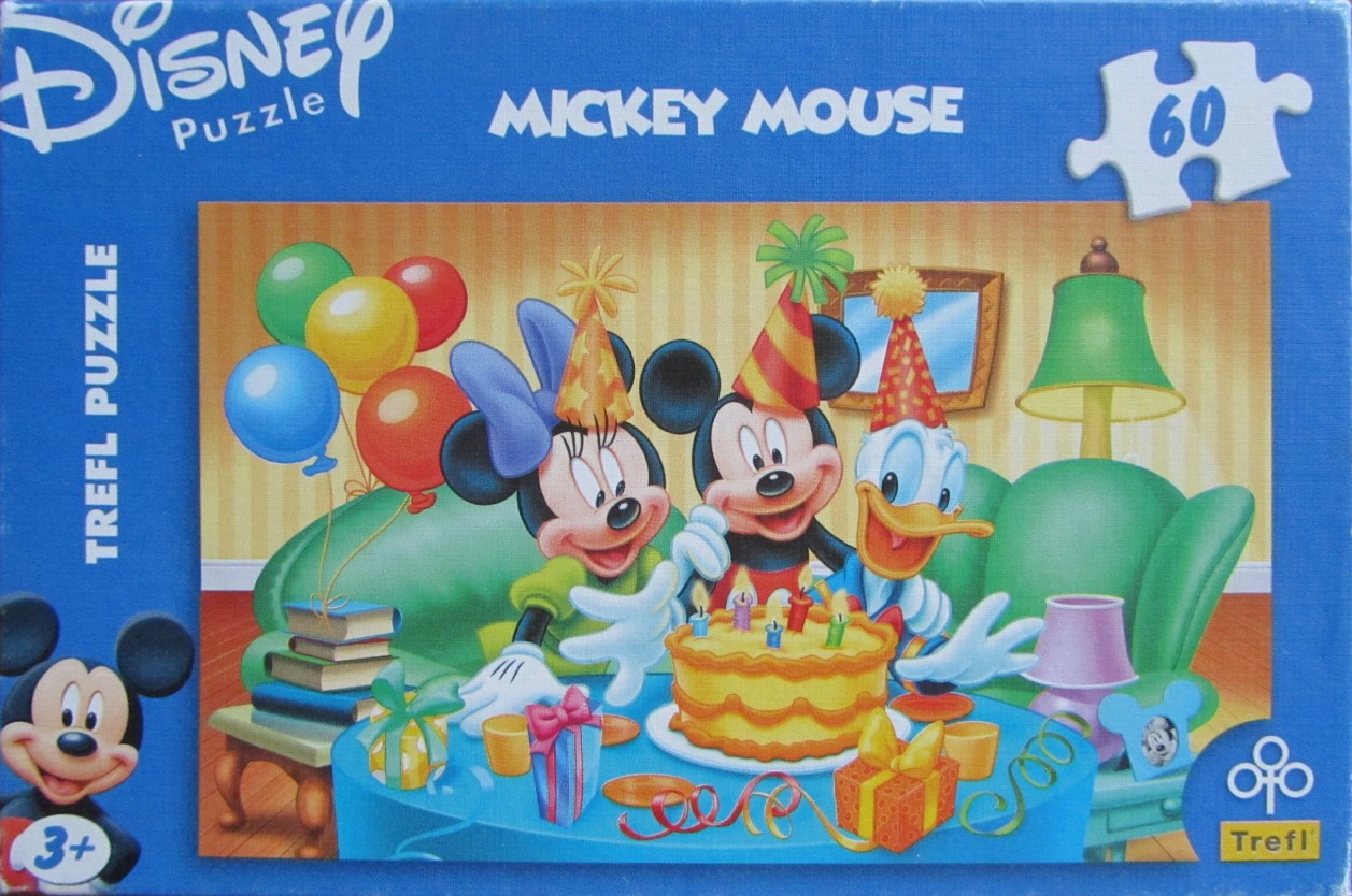 Minnie Mouse, Mickey Mouse, and Donald Duck celebrating a birthday around a cake.