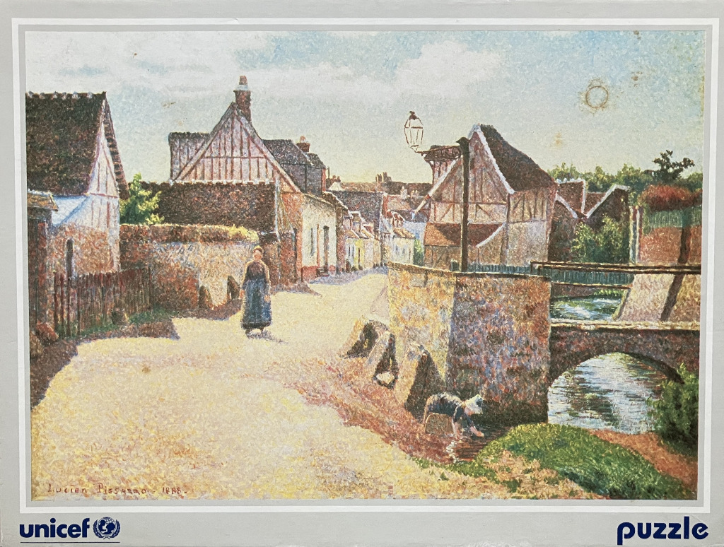 A neo-impressionist pointillist painting of a quiet French village street by Lucien Pissarro from 1888.